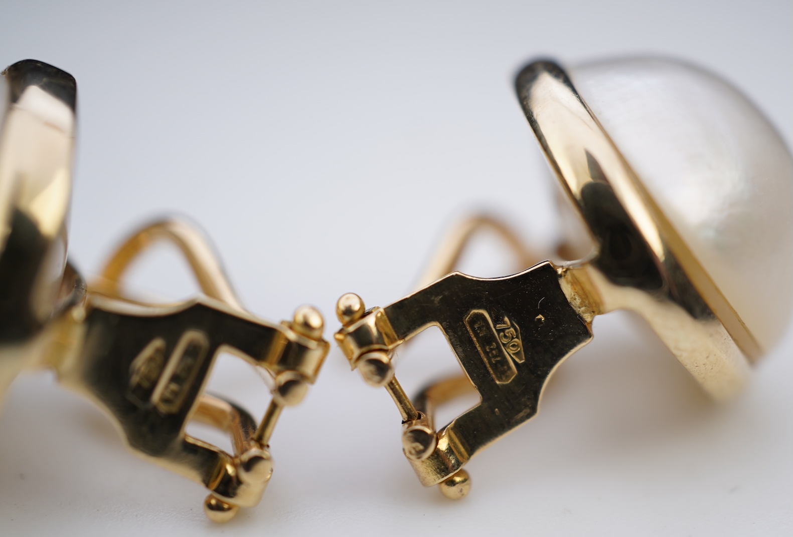 A pair of mabé cultured pearl earrings